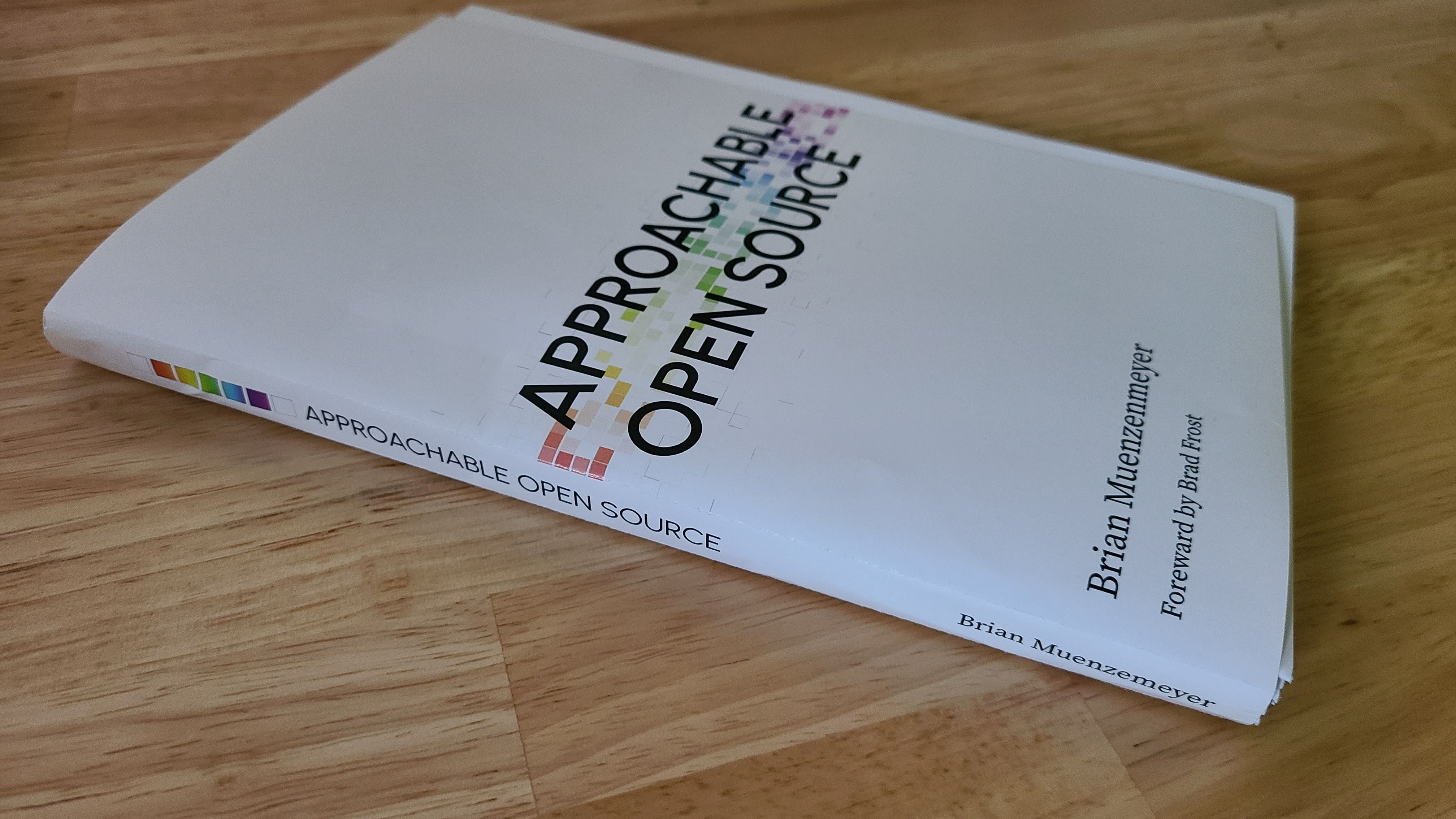 A photo of a proof of Approachable Open Source, unbound and already worn from a read-through!