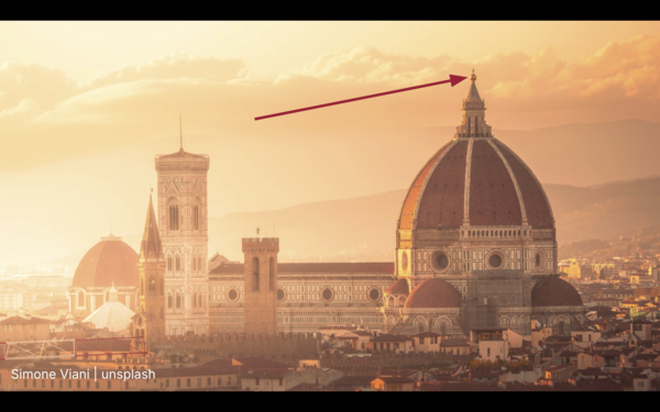 A photo of the Florence Cathedral by Simone Viani. An arrow added by me points to the copper sphere adorning the top.